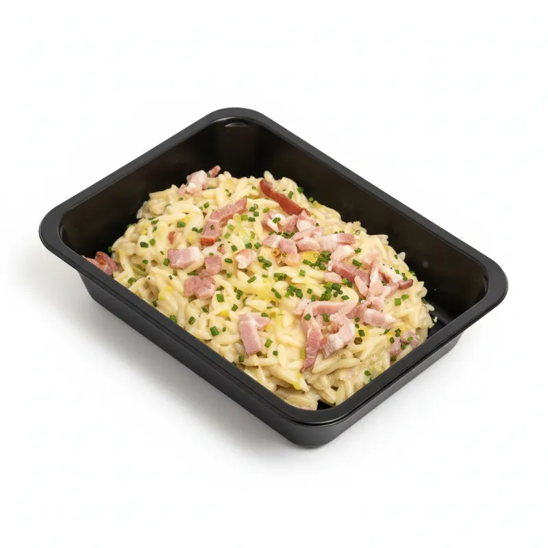 Griekse pasta met kaassaus, spek & prei