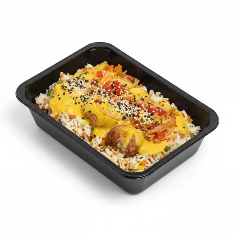 Meatballs met rijst, wokgroenten en currysaus